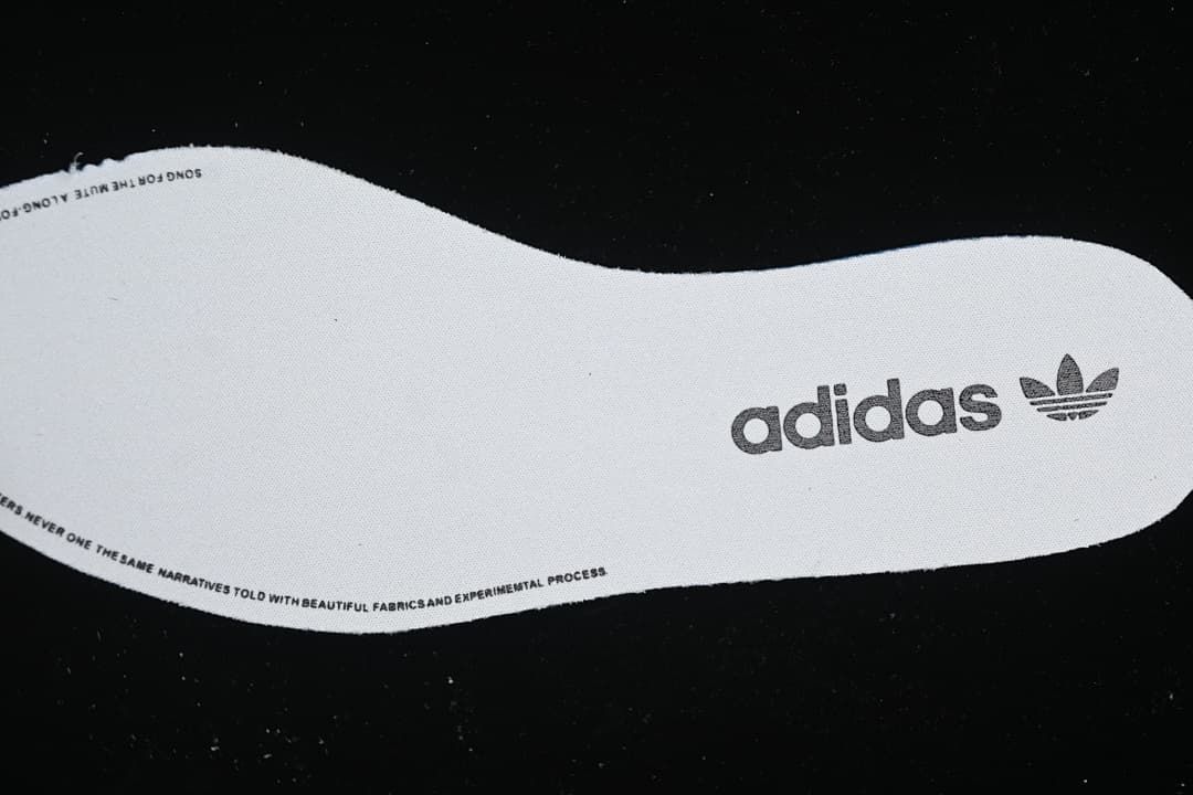 White insole with adidas Trefoil branding