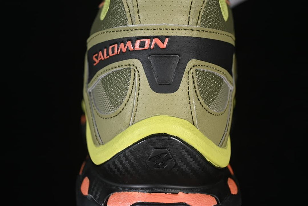 Rear view showing Salomon branding and contrasting heel details.