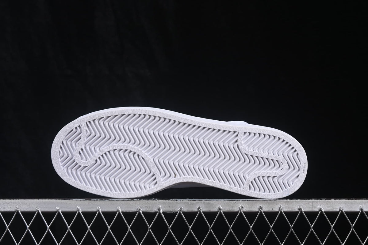Outsole view showing the white rubber tread pattern.