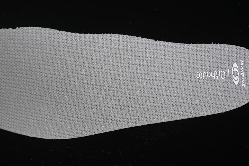 Close-up of a textured insole marked Ortholite.