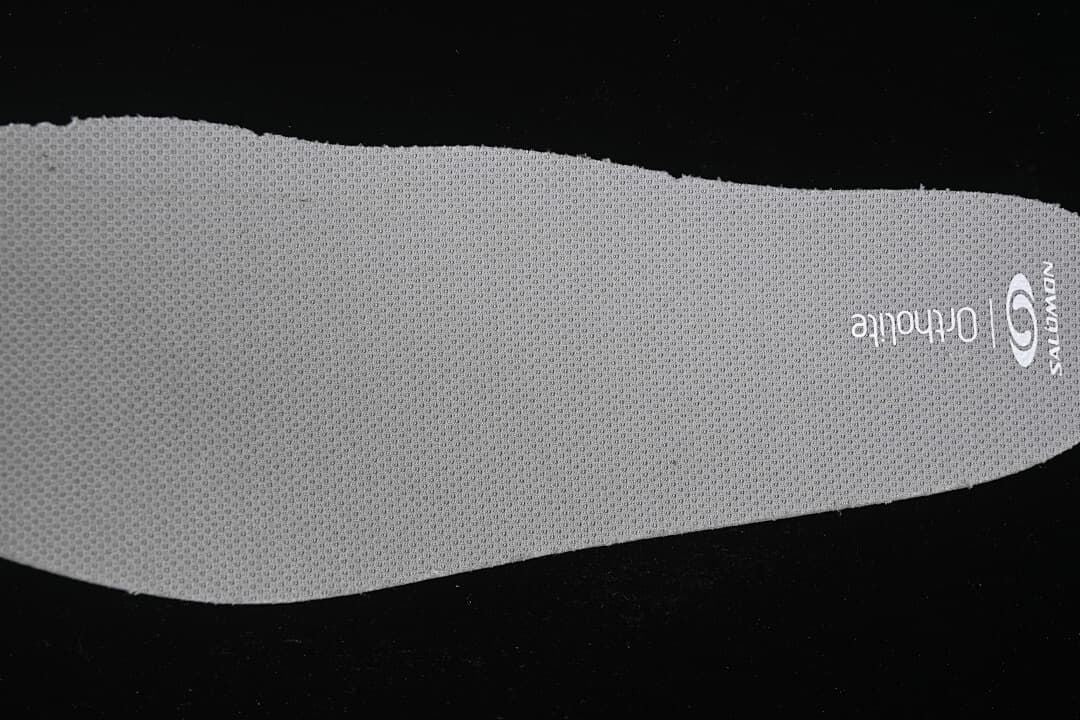 Close-up of a textured insole marked Ortholite.