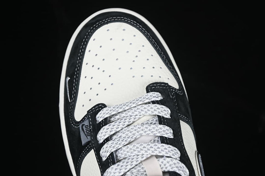 Top view of the perforated toe box and patterned laces.