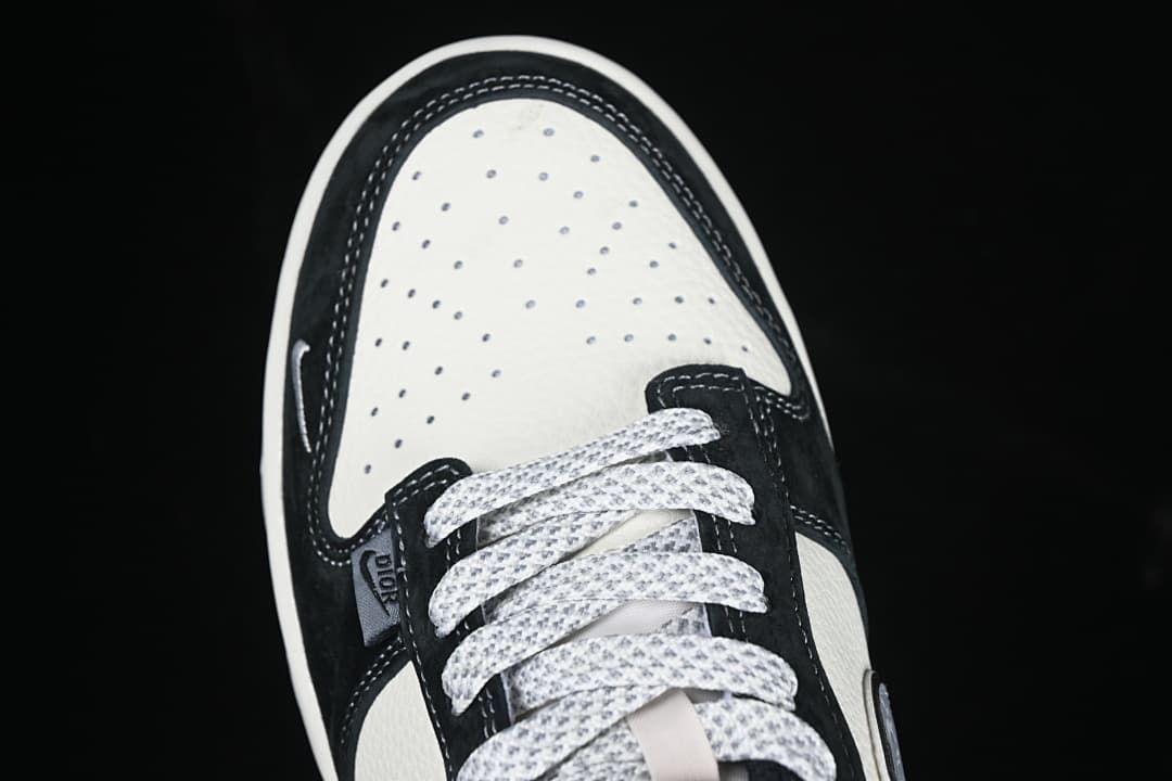 Top view of the perforated toe box and patterned laces.