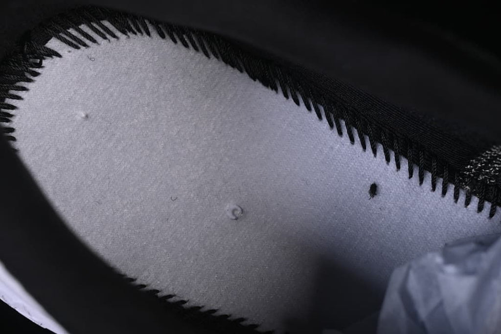 Close-up of the shoe's interior lining and stitching