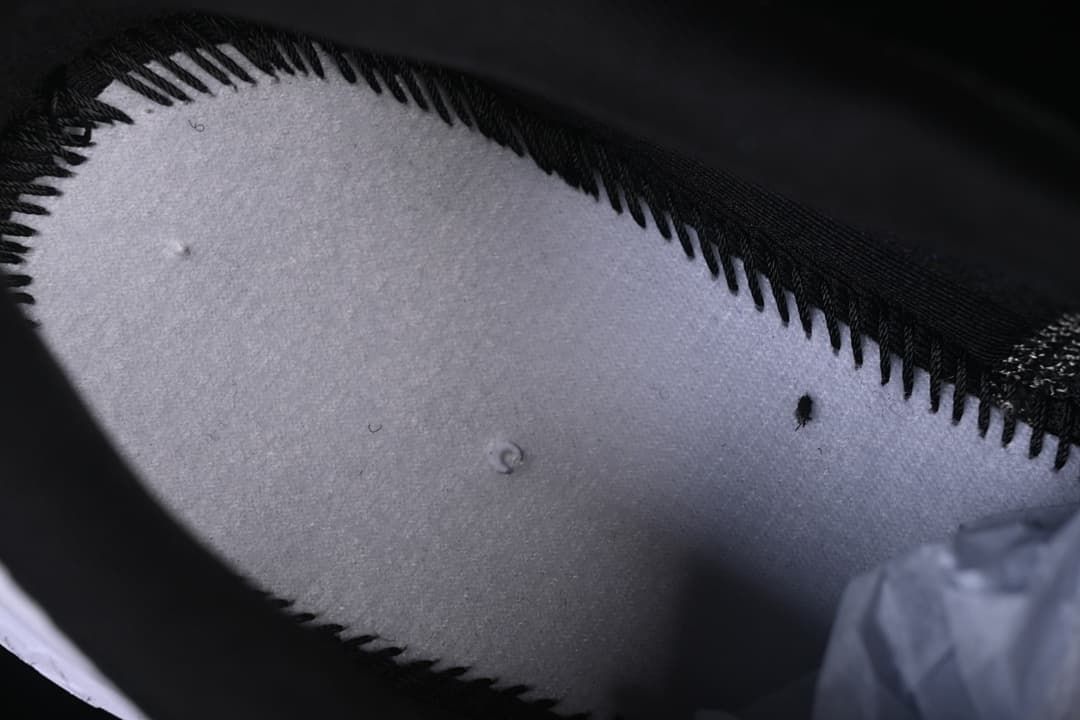 Close-up of the shoe's interior lining and stitching