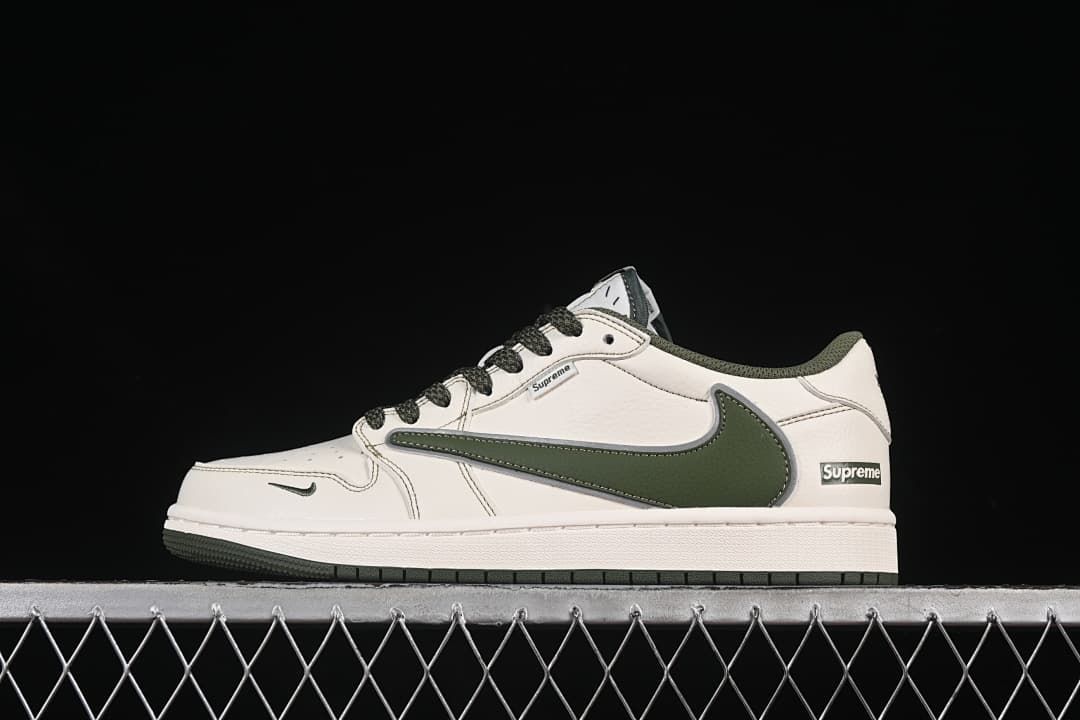 Side view of a white Nike low-top sneaker with a dark green Swoosh and dark green outsole