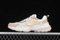 Side profile of white and beige Nike V2K Run sneakers