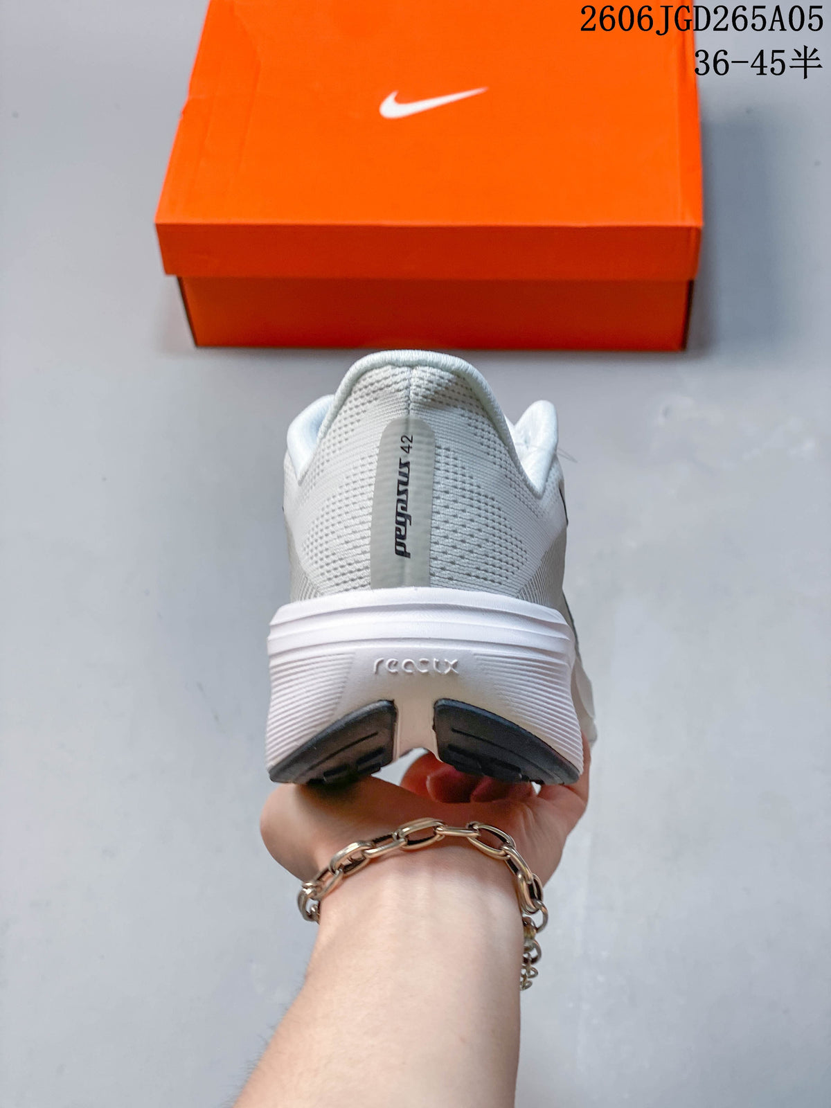 Heel view of a white Nike Pegasus 42 running shoe