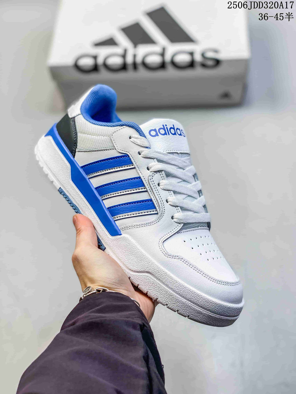 White adidas Entrap sneaker with bright blue side stripes and blue heel accents