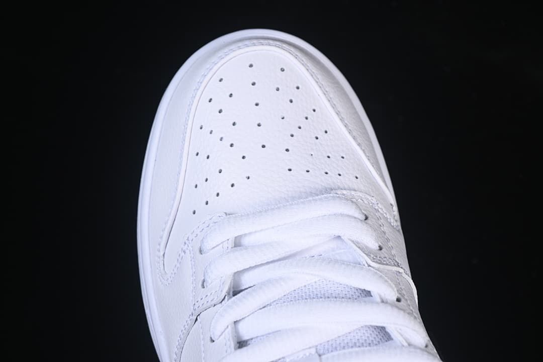 Top view of the perforated toe and laces