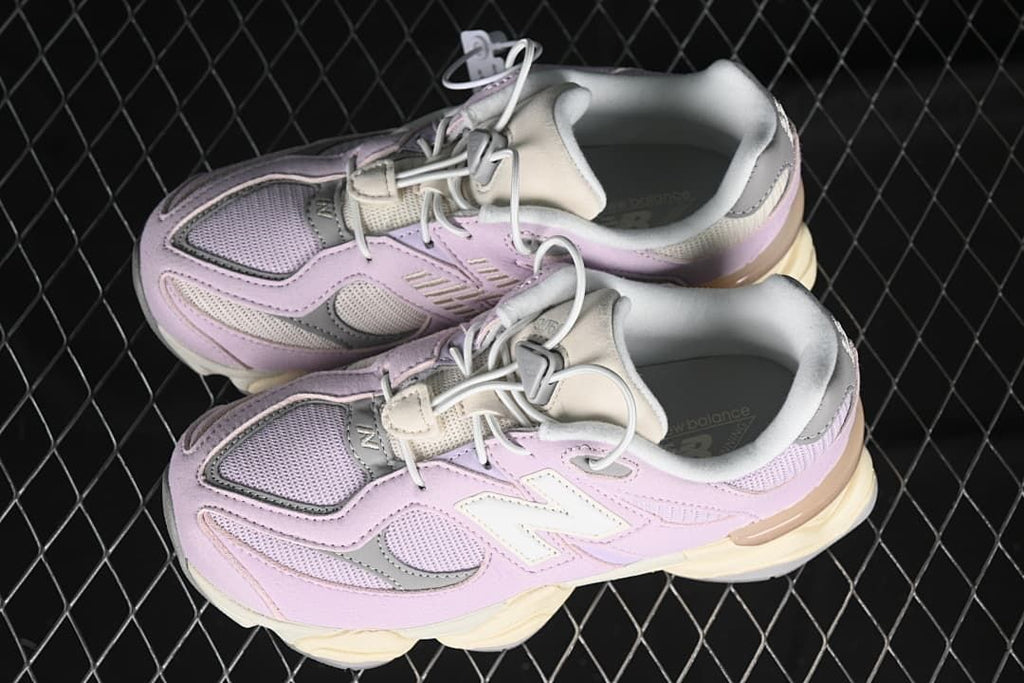 Pair of lavender and grey kids sneakers shown from above