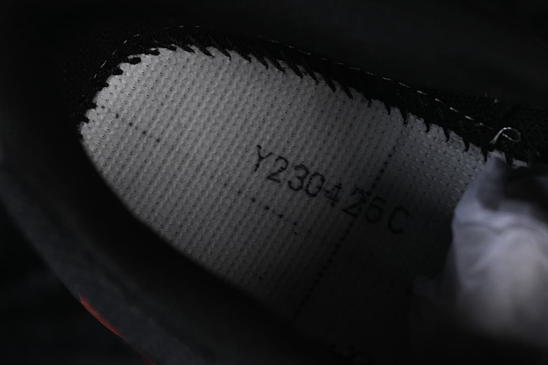 Close-up of the shoe interior showing the printed size 230-26C