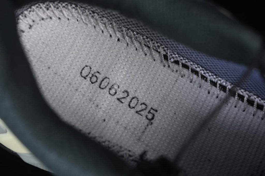 Close-up of the inner shoe lining and printed manufacturing code.