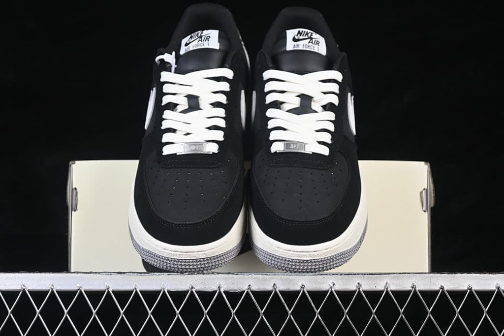 Front view of the pair showing perforated black toes and white laces
