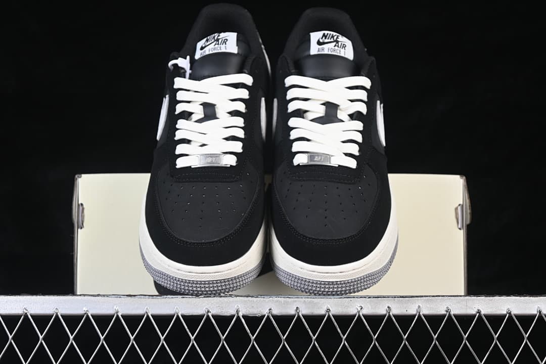 Front view of the pair showing perforated black toes and white laces