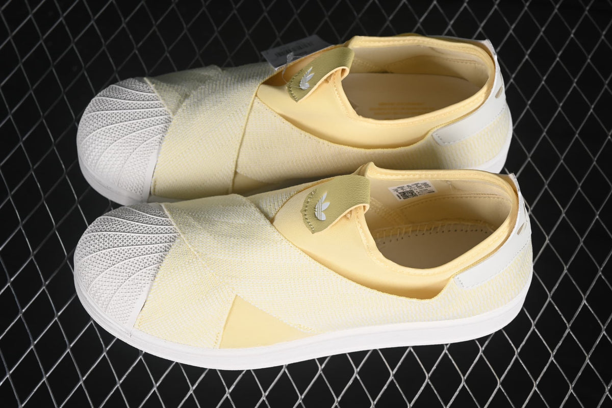 Top view of the pair showing the crossover upper panels and shell toes.