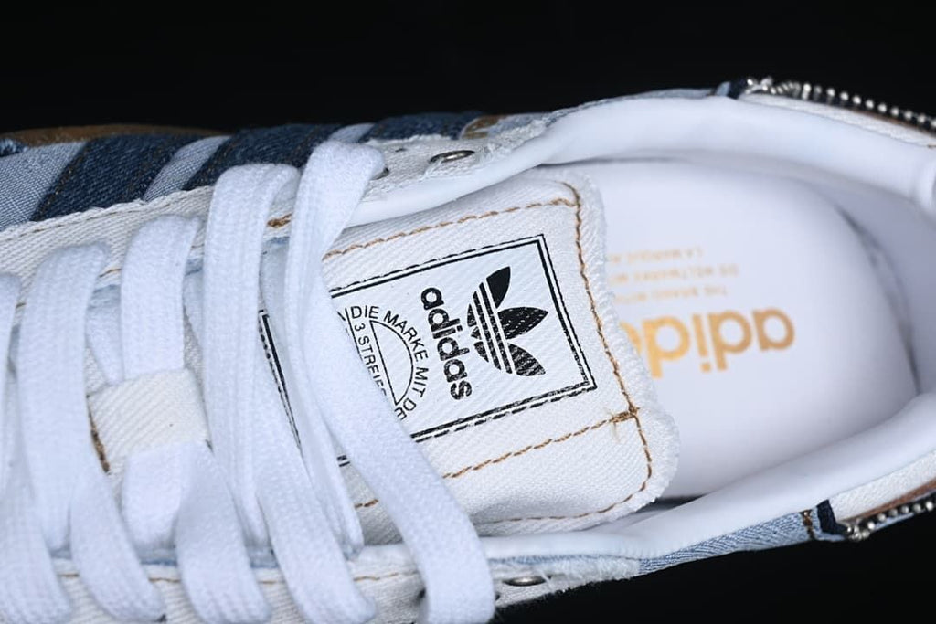 Close-up of tongue label, laces, and branded insole