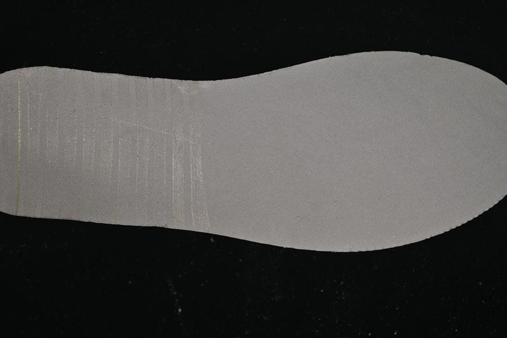 Grey removable insole shown from the underside