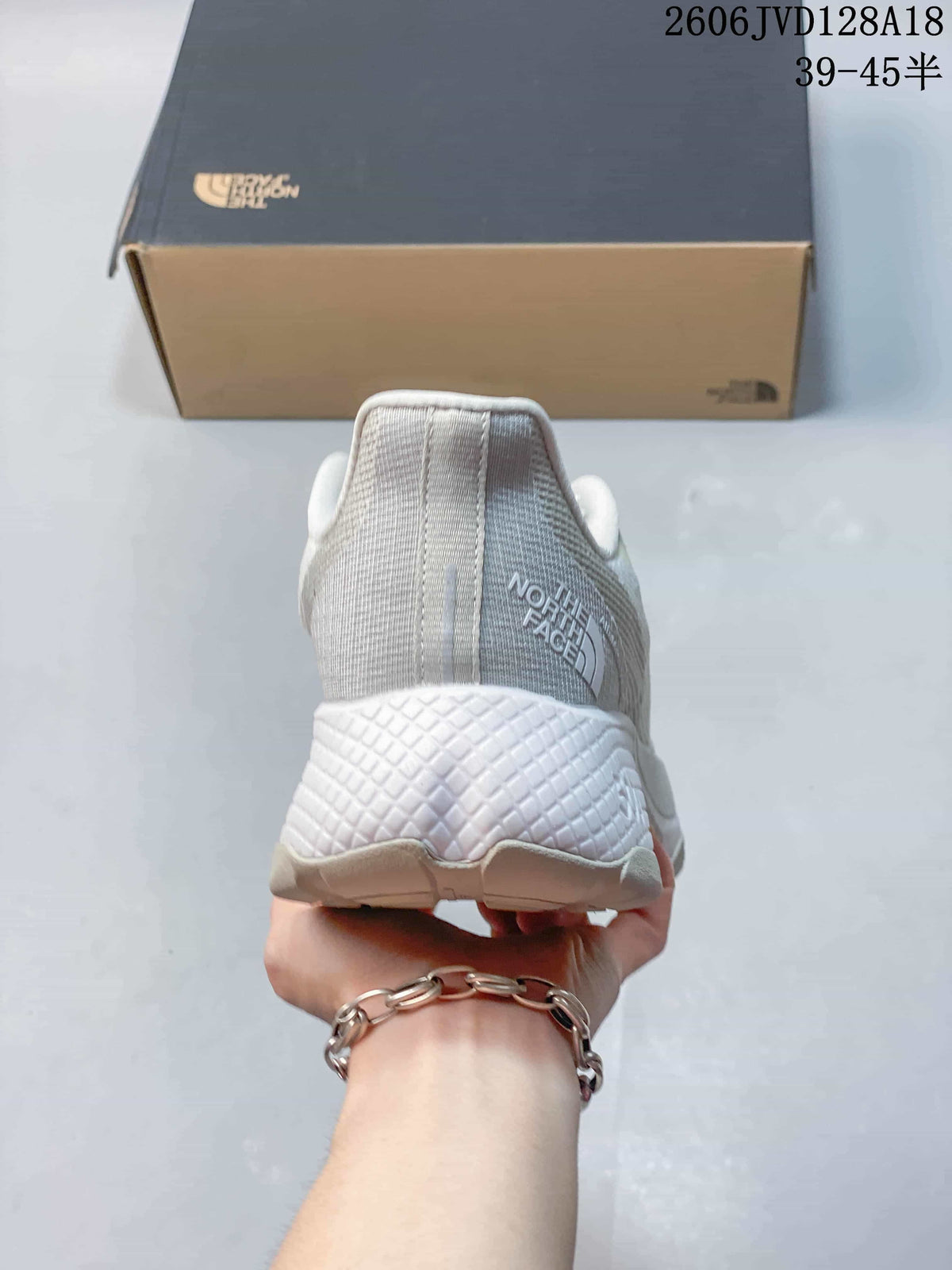 Rear view showing the heel and sculpted sole