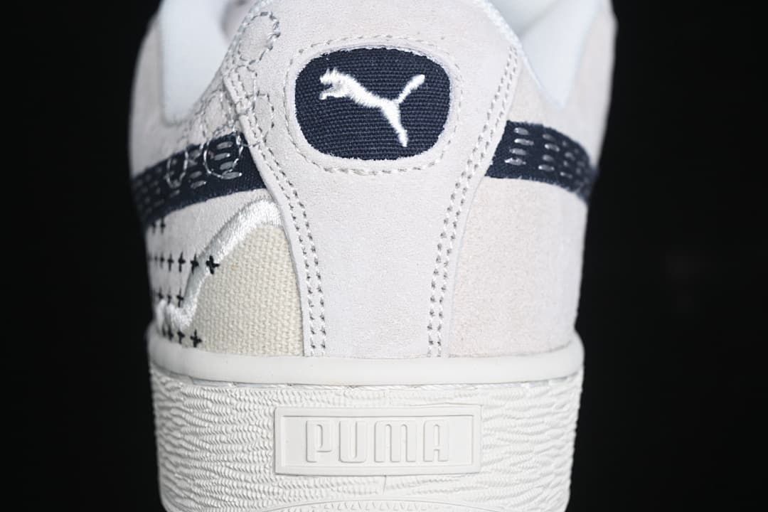 Rear close-up showing the Puma heel emblem and textured sole.