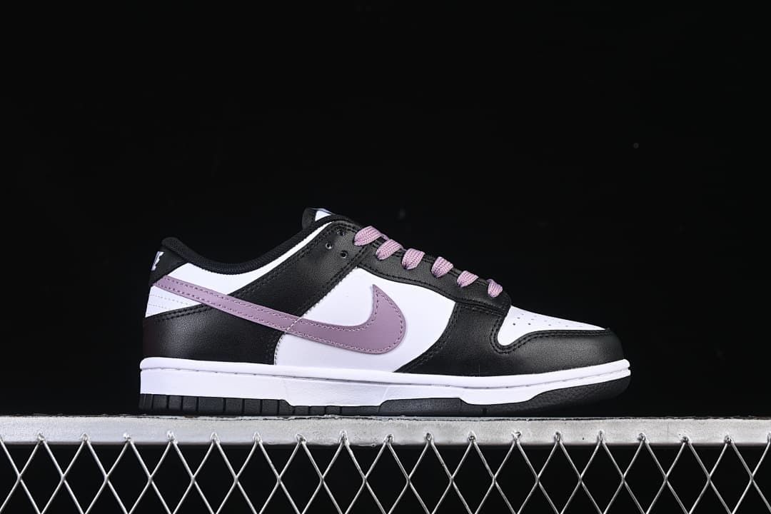 Side profile of the sneaker with purple Swoosh and white midsole