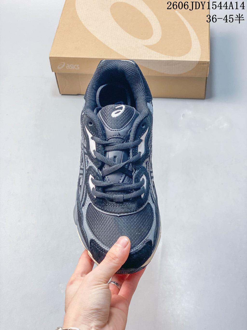 Top view of the sneaker showing its mesh toe panel and laces