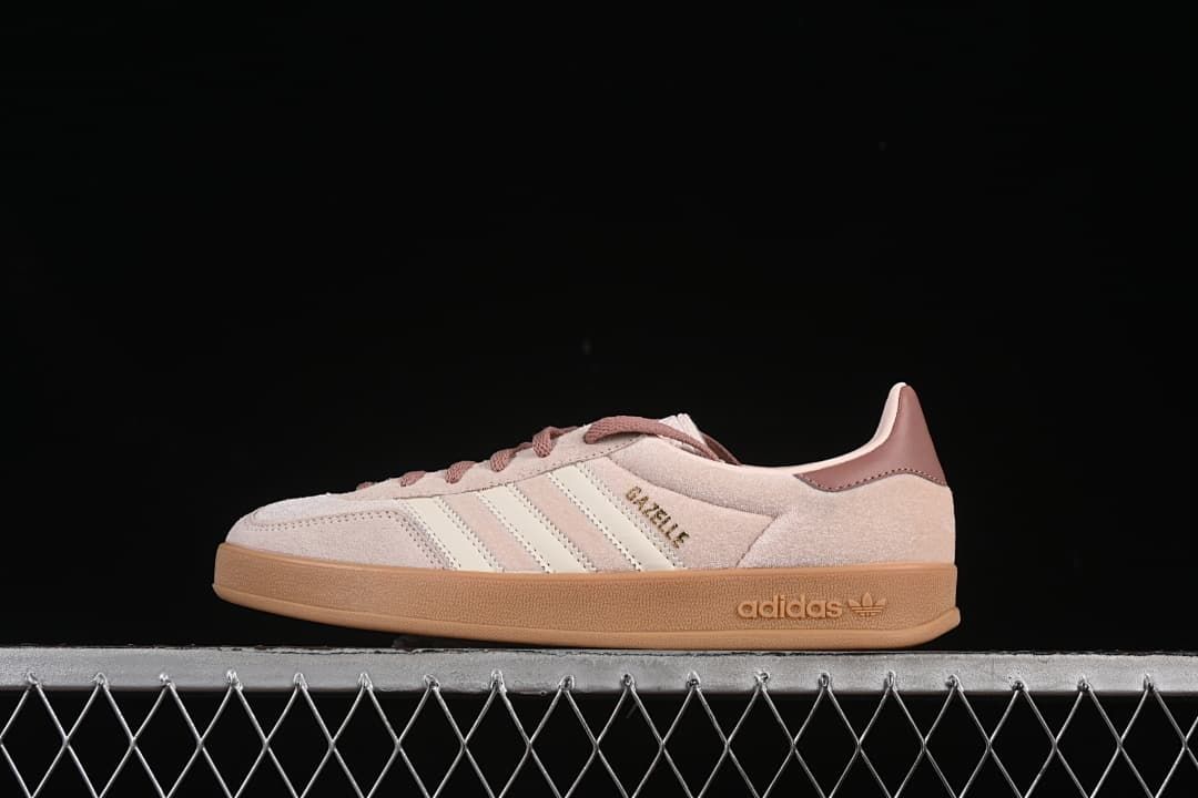 Side view of the Gazelle Indoor sneaker in pink and cream