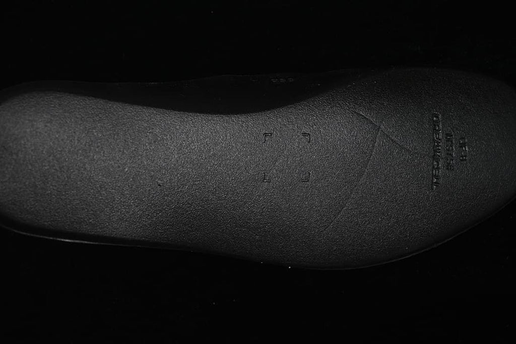 Close-up of the black sneaker insole.