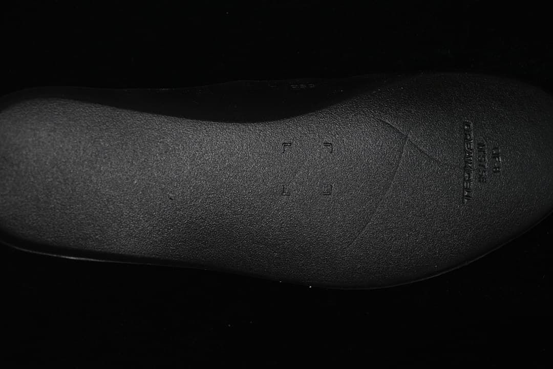 Close-up of the black sneaker insole.