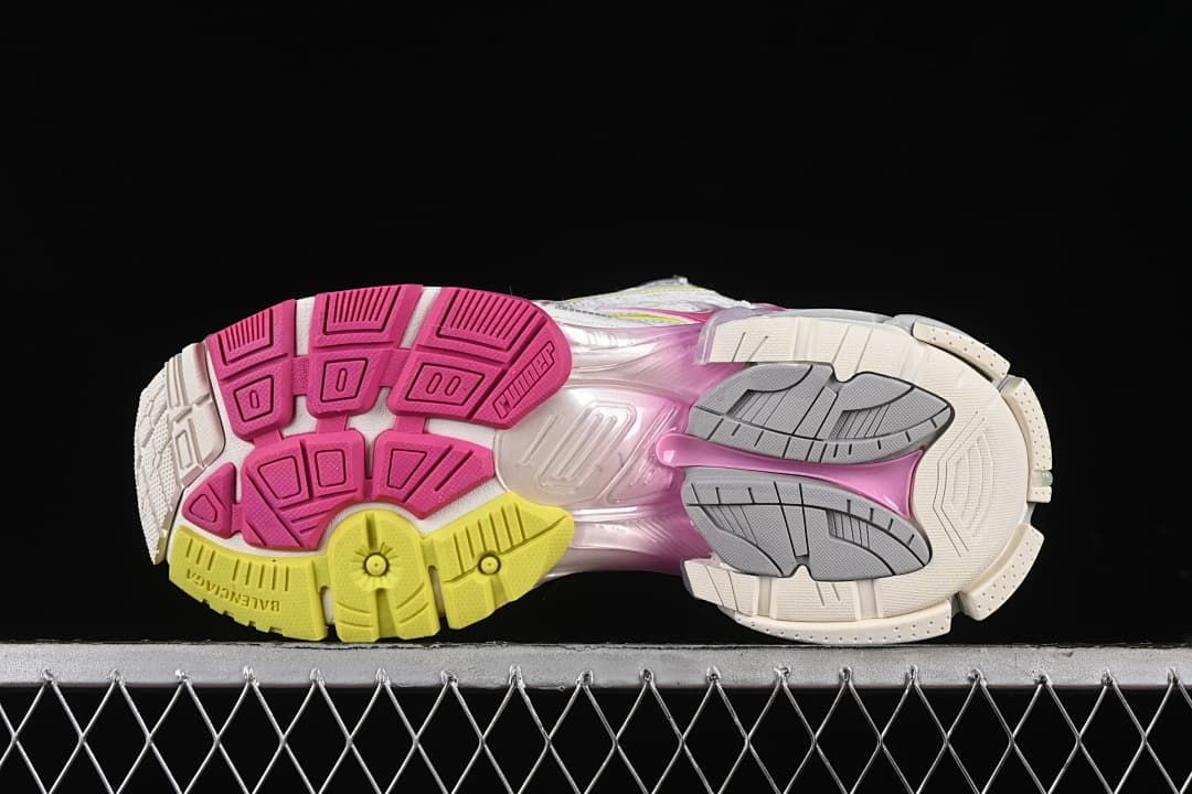 Underside view showing the multicolor tread pattern.