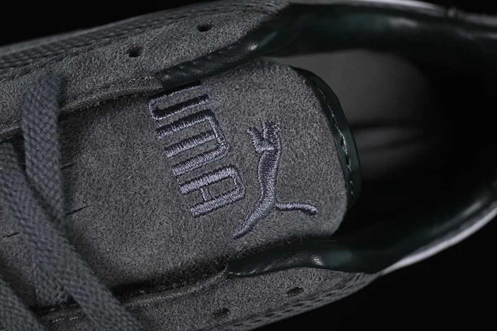 Close-up of Puma-branded tongue and laces