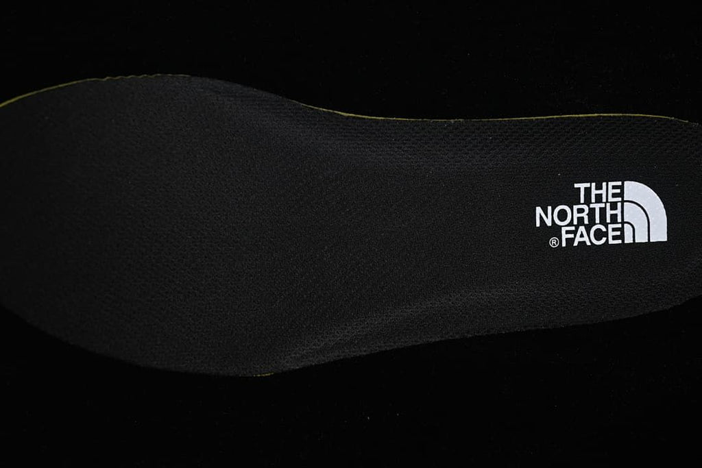 Close-up of the black insole with The North Face logo.