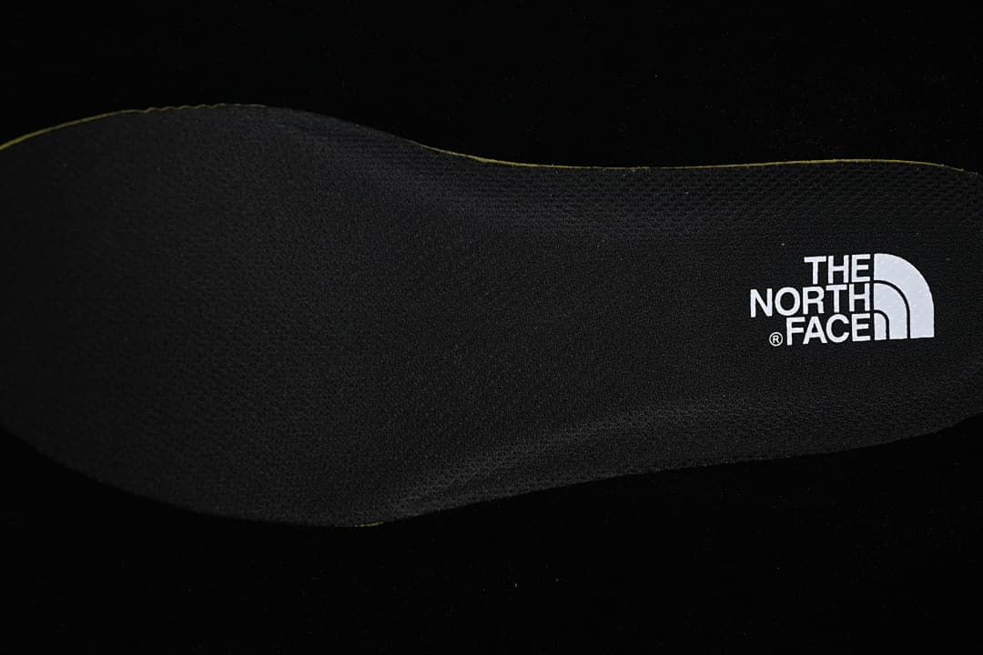 Close-up of the black insole with The North Face logo.
