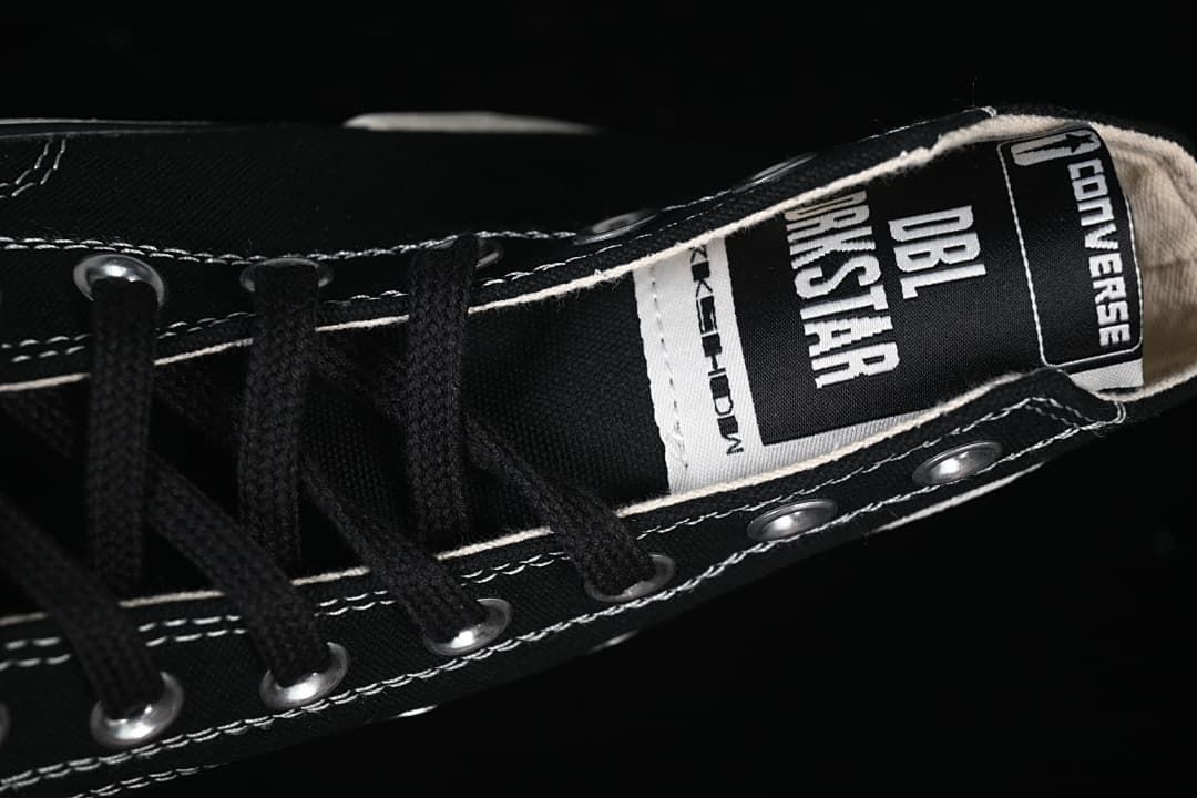 Close-up of tongue labels with Converse and DRKSHDW text