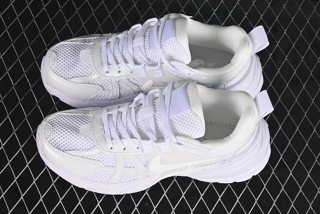 Pair of white Nike V2K Run sneakers viewed from above