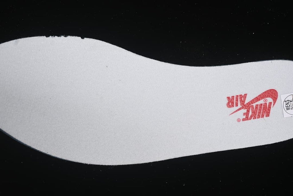 White shoe insole with red Nike Air branding and a size sticker