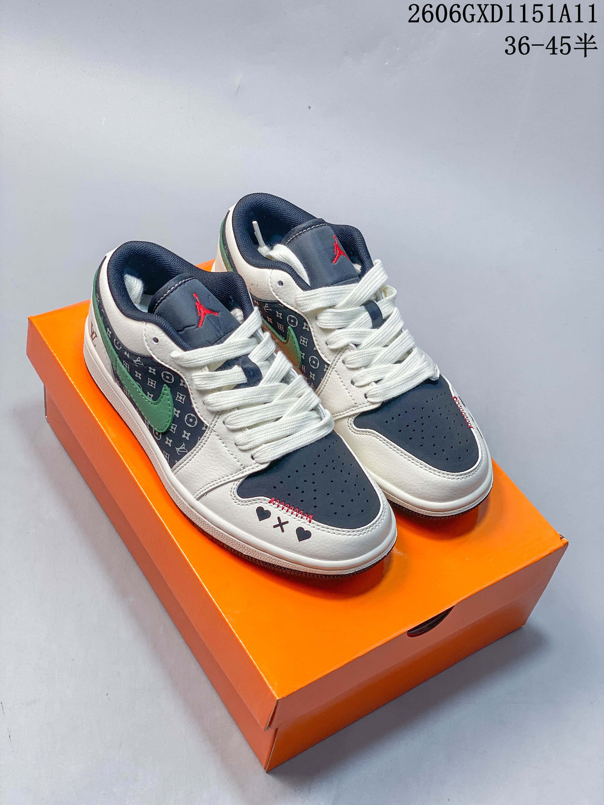 Pair of white, navy, and green low-top Air Jordan 1 sneakers with patterned side panels and toe details.