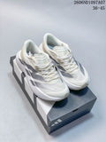 Pair of off-white adidas Adizero Evo SL running shoes with silver stripes, shown on a shoebox.