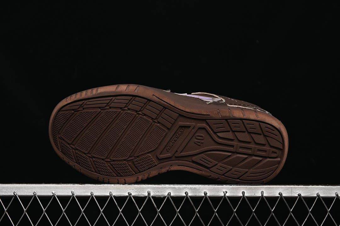 Underside view showing the patterned brown outsole