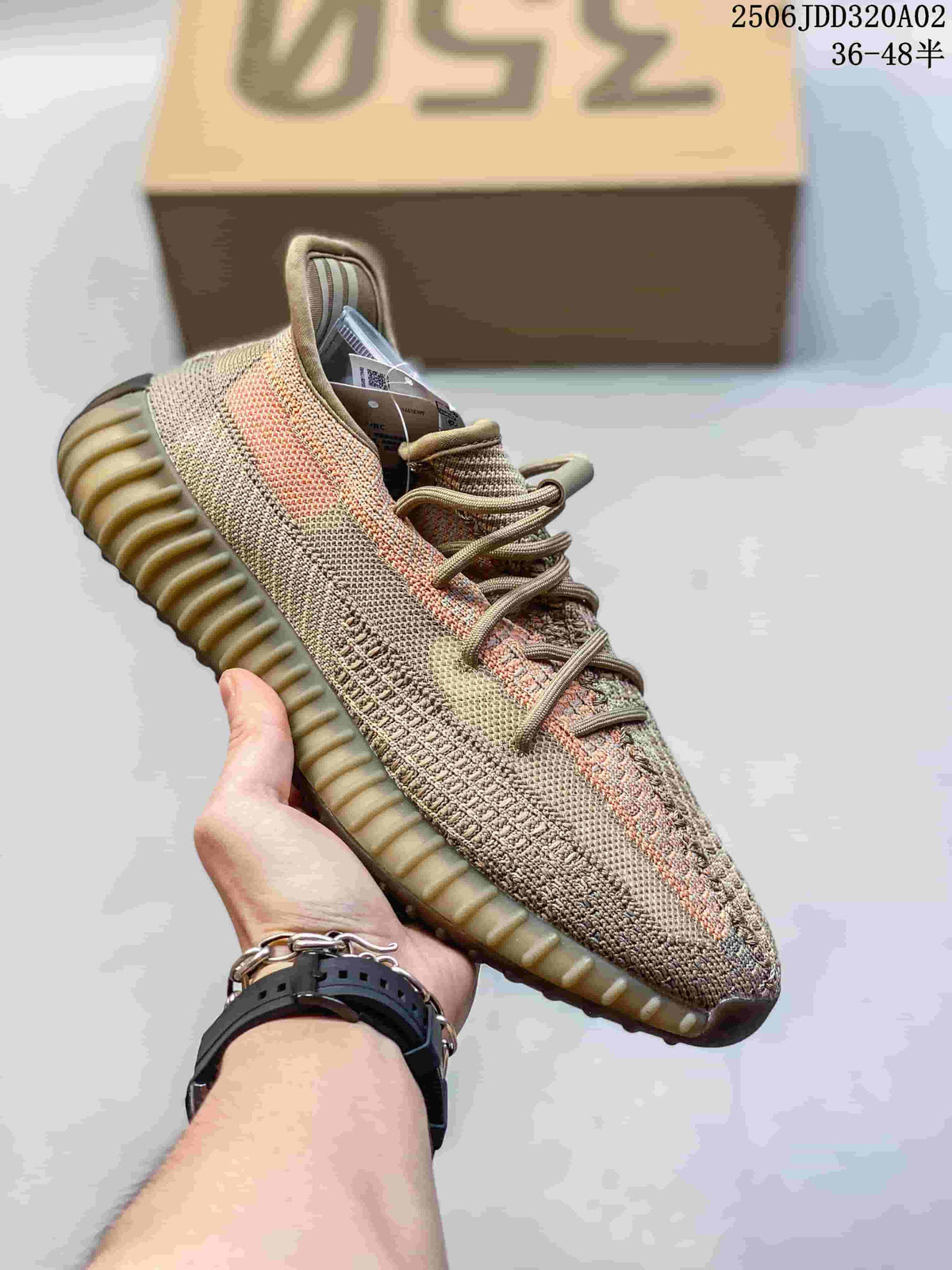 Tan and multicolor knit low-top sneaker with a ribbed gum-tone sole.