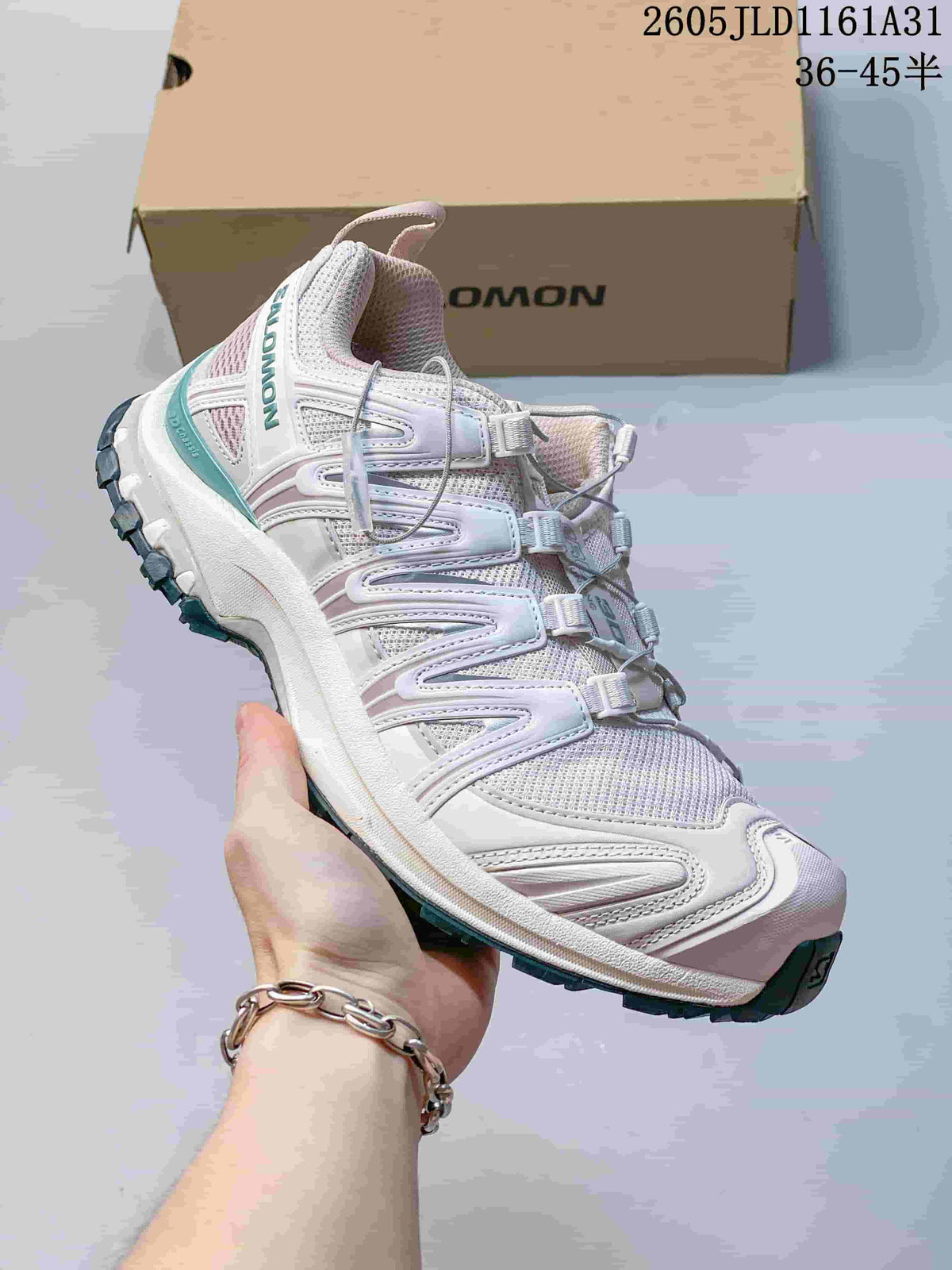 Angled side view of a white Salomon XA Pro 3D sneaker with a lugged outsole