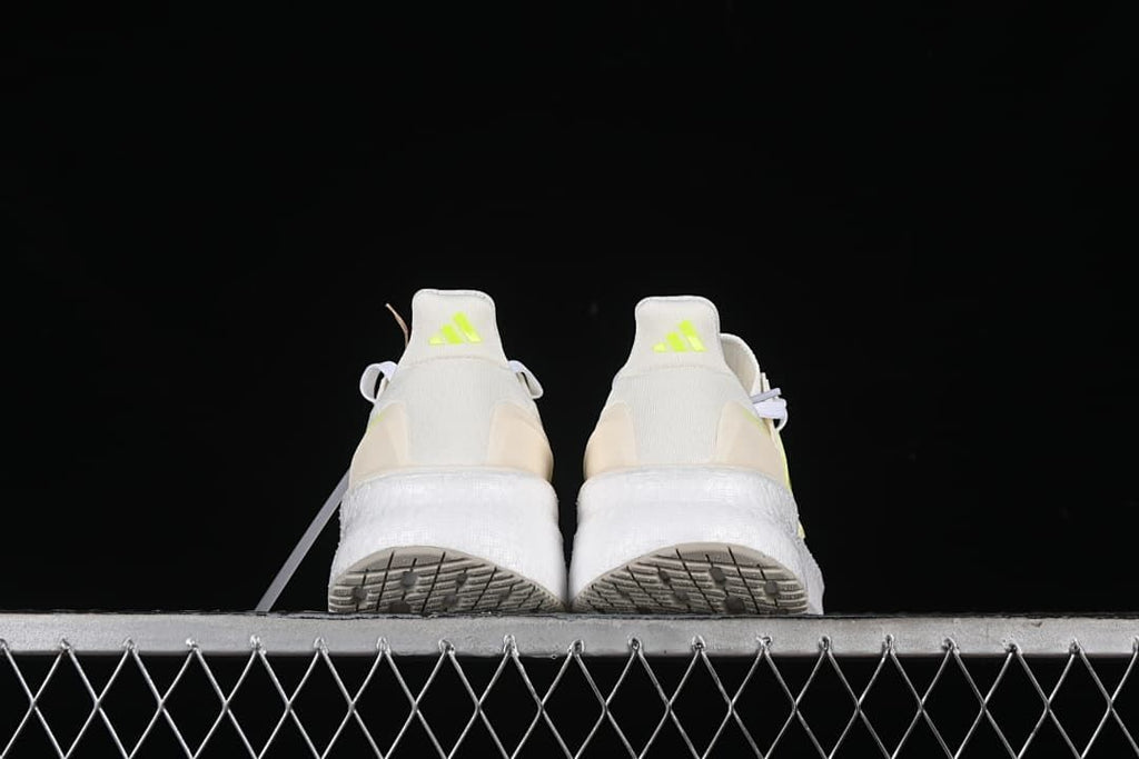 Rear view of both shoes and their outsoles