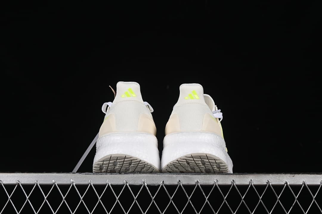 Rear view of both shoes and their outsoles