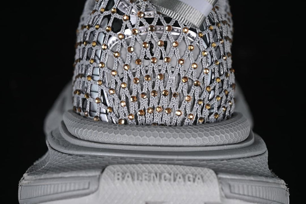 Rear close-up of the openwork upper and sculpted heel.