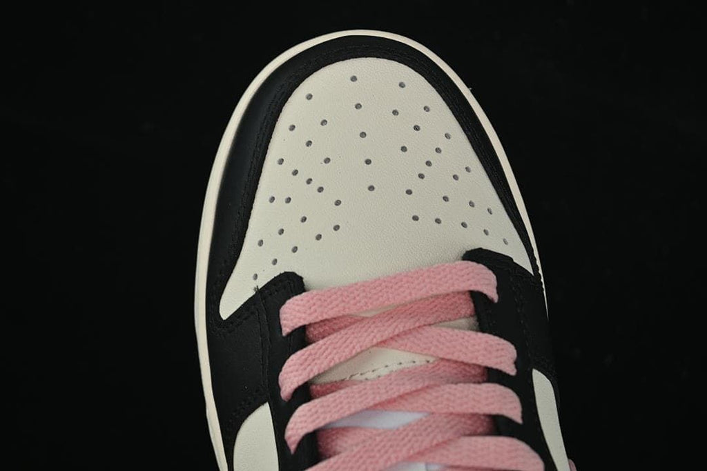 Top view of the perforated off-white toe and pink laces