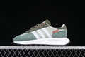 Side view of the adidas Retropy E5 in green, gray, and white with muted pink lace loops