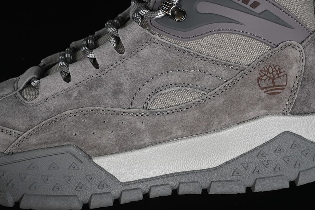 Close-up of the side panels, logo, laces, and outsole