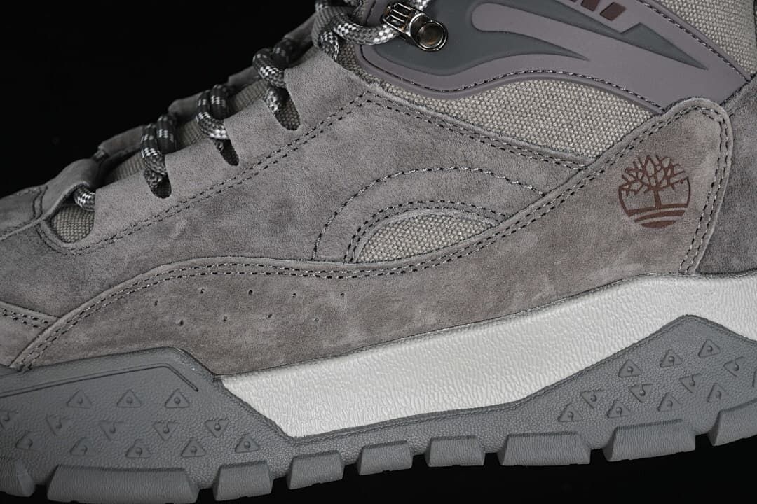 Close-up of the side panels, logo, laces, and outsole