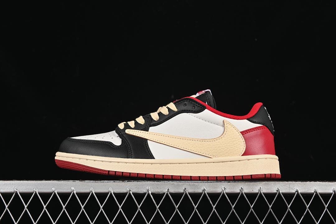 Side view of the low-top sneaker with cream oversized Swoosh and red outsole