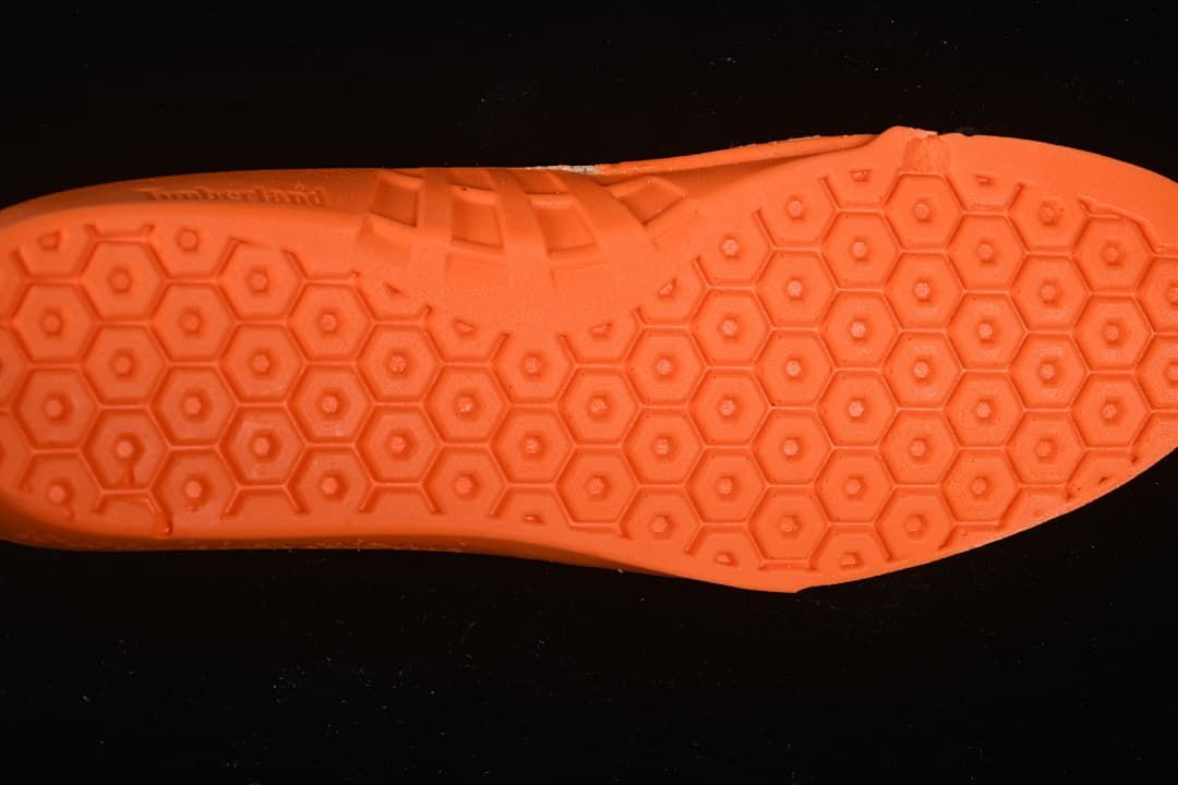Close-up of the boot outsole with hexagonal tread pattern
